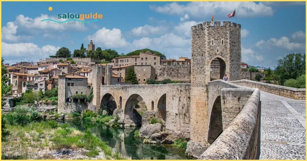 **Alternative text:**
*Besalú’s ancient stone bridge leading into a charming medieval village, where Catalonia’s past still whispers through every quiet street*